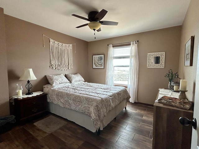 55 Mills Rd, Whitehall, MT 59759 - bedroom with dark wood finished floors and ceiling fan