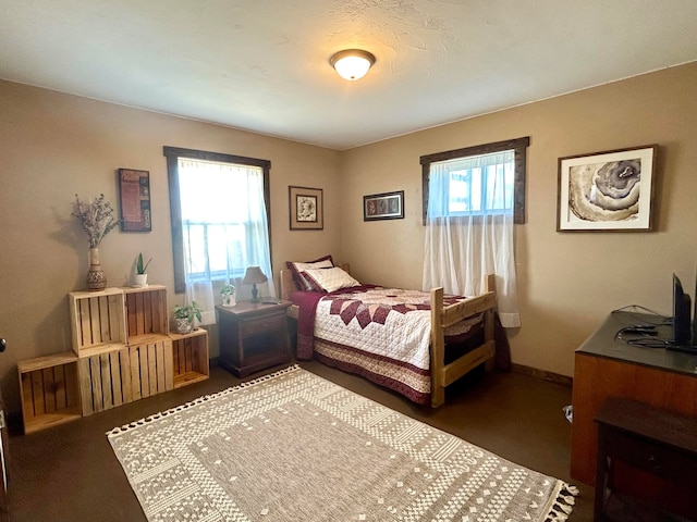 55 Mills Rd, Whitehall, MT 59759 - carpeted bedroom featuring baseboards