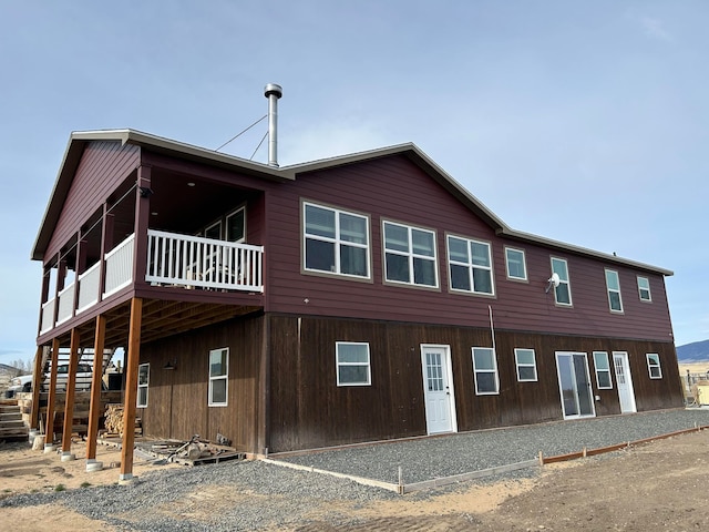 55 Mills Rd, Whitehall, MT 59759 - view of side of home featuring a wooden deck