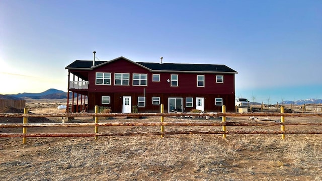 55 Mills Rd, Whitehall, MT 59759 - rear view of property featuring a mountain view and board and batten siding