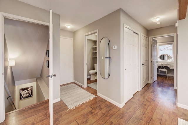 710 Joslyn St, Helena, MT 59601 - hall featuring light wood-style flooring and an upstairs landing