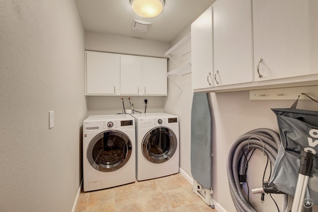 710 Joslyn St, Helena, MT 59601 - laundry area with cabinet space and washer and clothes dryer