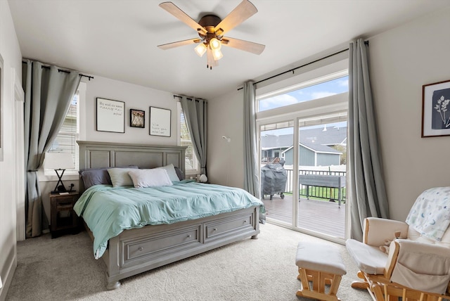 200 Ali Loop, Kalispell, MT 59901 - bedroom with access to exterior, carpet flooring, and ceiling fan