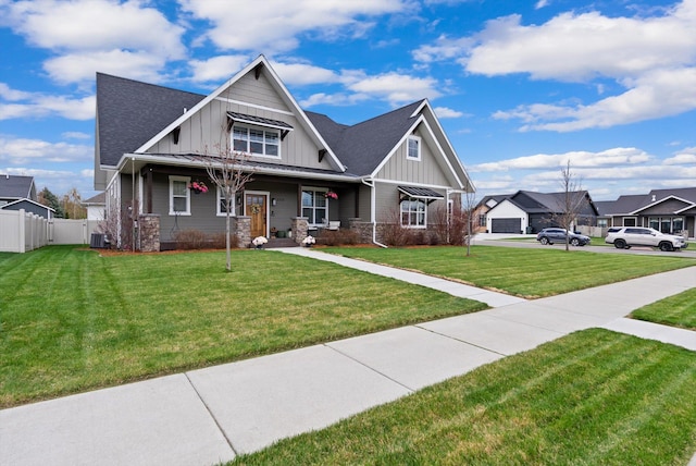 200 Ali Loop, Kalispell, MT 59901 - craftsman inspired home with board and batten siding, a porch, roof with shingles, and stone siding