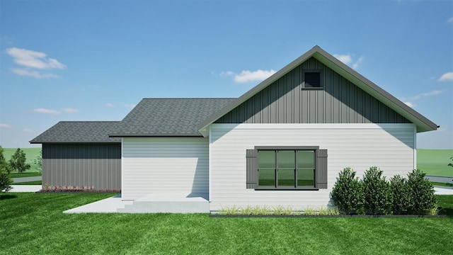 NHNLOT2 England Blvd, Missoula, MT 59808 - back of house featuring board and batten siding, a lawn, and roof with shingles
