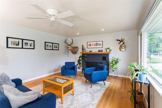 1004 Park Ave, Whitefish, MT 59937 - living area featuring wood finished floors, a fireplace, recessed lighting, and a ceiling fan