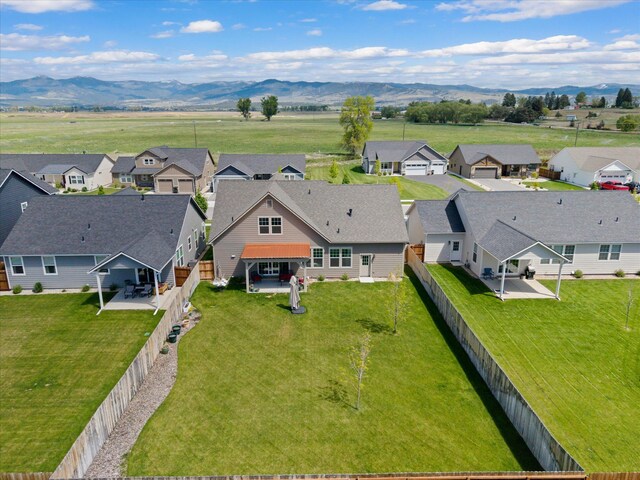 203 Kismet Ct, Hamilton, MT 59840 - aerial view of residential area with a mountainous background