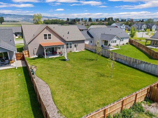 203 Kismet Ct, Hamilton, MT 59840 - aerial view of residential area with a mountainous background