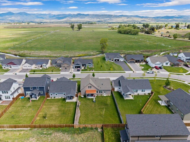 203 Kismet Ct, Hamilton, MT 59840 - overview of rural landscape featuring a mountainous background and nearby suburban area