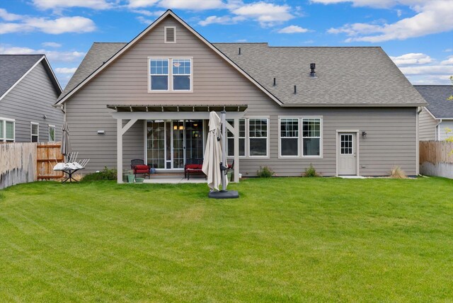 203 Kismet Ct, Hamilton, MT 59840 - back of house featuring a patio area and a shingled roof
