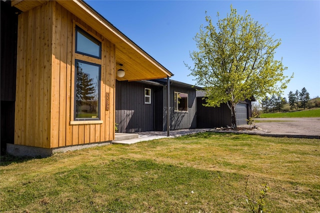 33766 W Shore Dr, Polson, MT 59860 - rear view of house with a yard