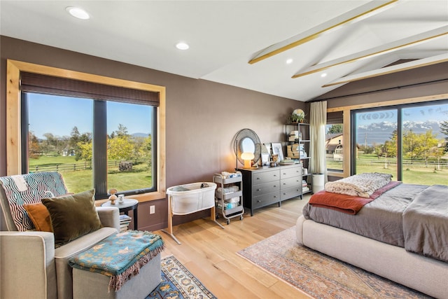 33766 W Shore Dr, Polson, MT 59860 - bedroom featuring access to outside, recessed lighting, and wood finished floors