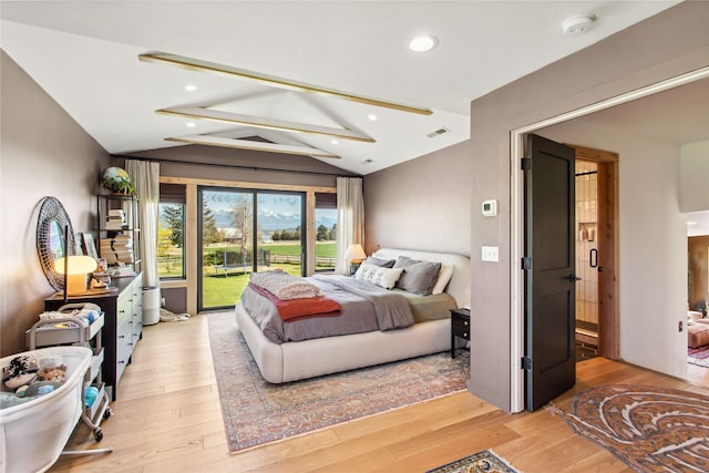 33766 W Shore Dr, Polson, MT 59860 - bedroom with access to outside, light wood-type flooring, and recessed lighting