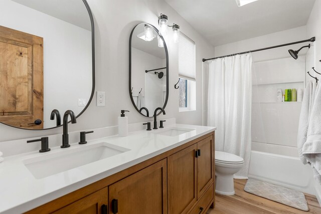 212 Water Way, Darby, MT 59829 - full bathroom with toilet, shower / tub combo, double vanity, and wood finished floors