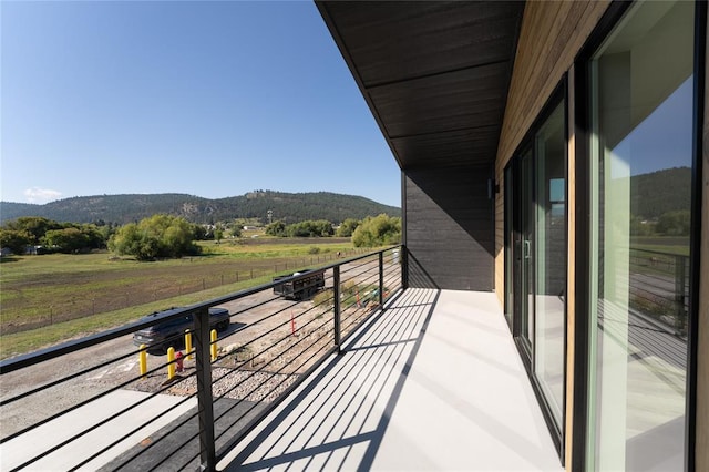 861 9th St W, Kalispell, MT 59901 - balcony featuring a mountain view