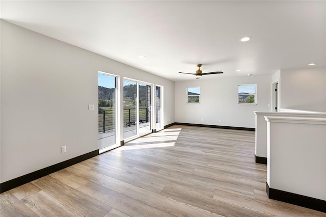 861 9th St W, Kalispell, MT 59901 - empty room with light wood-style flooring, recessed lighting, and ceiling fan
