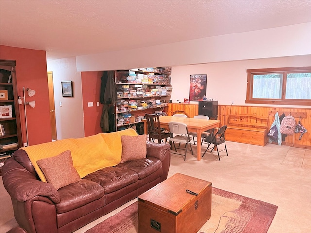 living area featuring light colored carpet