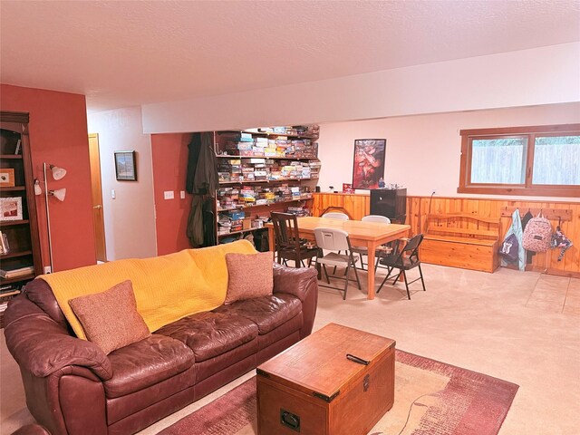 1765 Cyprus Ct, Missoula, MT 59801 - living room with light colored carpet and wood walls