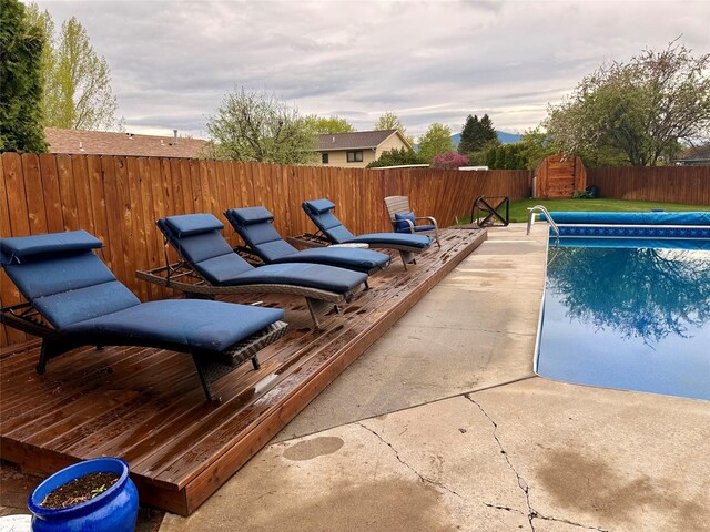1765 Cyprus Ct, Missoula, MT 59801 - view of swimming pool featuring a fenced backyard and a patio
