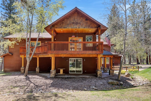 303 Wyant Ln, Hamilton, MT 59840 - rear view of house with a patio