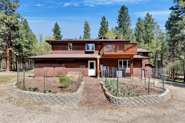 303 Wyant Ln, Hamilton, MT 59840 - view of front of home with a chimney and central AC