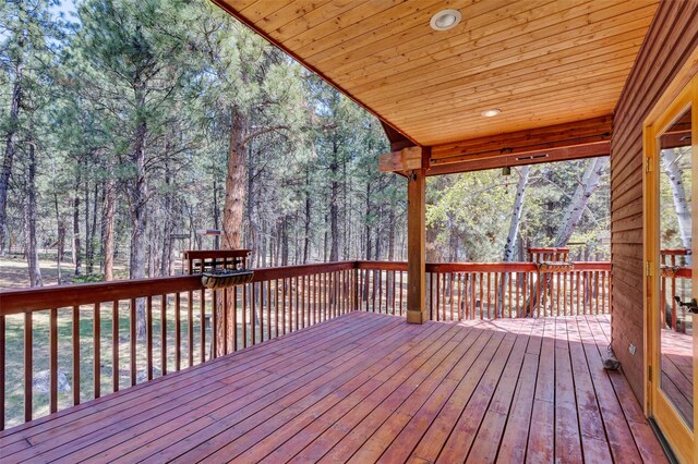 303 Wyant Ln, Hamilton, MT 59840 - deck featuring view of wooded area