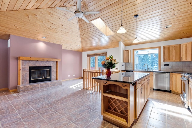 303 Wyant Ln, Hamilton, MT 59840 - kitchen with stainless steel appliances, wooden ceiling, open shelves, a center island, and plenty of natural light