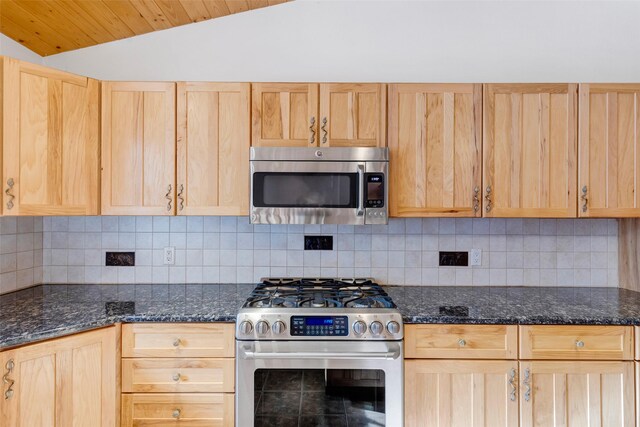 303 Wyant Ln, Hamilton, MT 59840 - kitchen featuring stainless steel appliances, light brown cabinets, vaulted ceiling, backsplash, and wooden ceiling