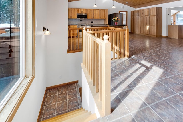 303 Wyant Ln, Hamilton, MT 59840 - staircase featuring vaulted ceiling