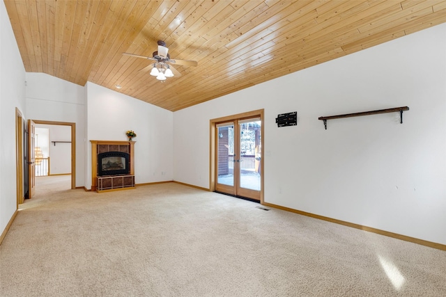 303 Wyant Ln, Hamilton, MT 59840 - unfurnished living room with wooden ceiling, carpet floors, ceiling fan, baseboards, and a fireplace