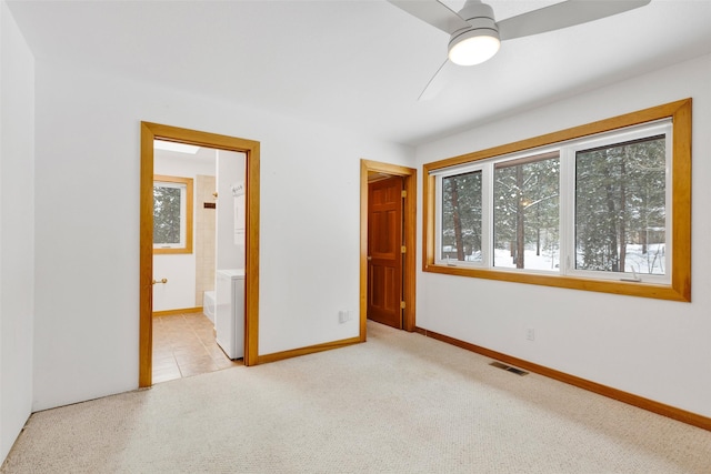303 Wyant Ln, Hamilton, MT 59840 - unfurnished bedroom with baseboards, ensuite bath, and carpet flooring