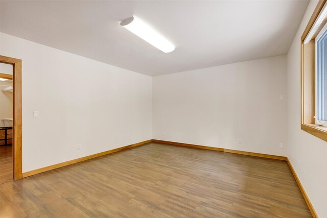 303 Wyant Ln, Hamilton, MT 59840 - empty room featuring light wood-style floors and baseboards