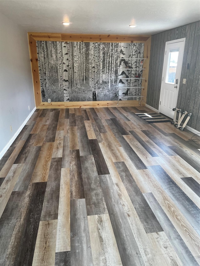 detailed view of wood finished floors and baseboards