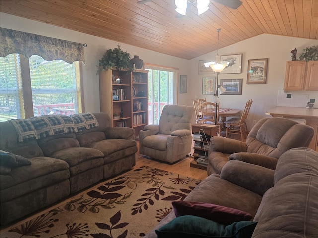 57 Rudolph Ct, Haugan, MT 59842 - living room with lofted ceiling, light wood finished floors, wood ceiling, and ceiling fan