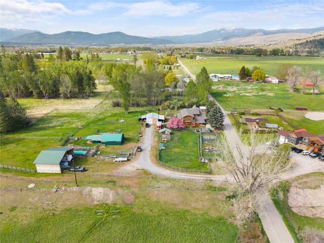 aerial view of property's location featuring mountains