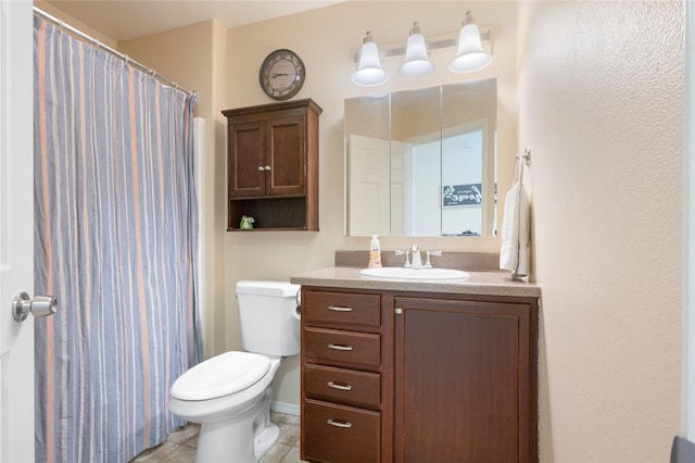 full bath with toilet, vanity, tile patterned floors, and a shower with shower curtain