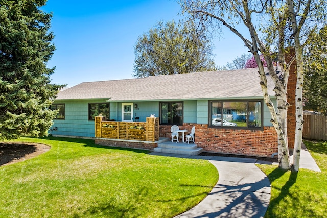 3024 8th Ave S, Great Falls, MT 59405 - ranch-style house featuring brick siding and roof with shingles