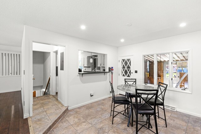 3024 8th Ave S, Great Falls, MT 59405 - dining space with recessed lighting and baseboards