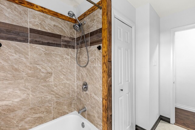 3024 8th Ave S, Great Falls, MT 59405 - bathroom featuring shower / bath combination and baseboards