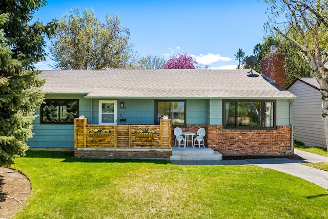 3024 8th Ave S, Great Falls, MT 59405 - single story home with a front lawn, covered porch, and a shingled roof