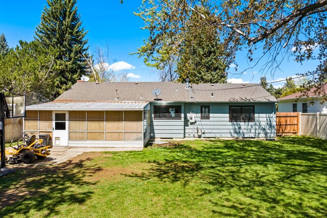 3024 8th Ave S, Great Falls, MT 59405 - rear view of house with a sunroom and roof with shingles