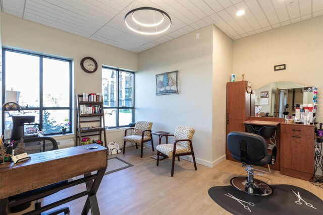 office featuring light wood-type flooring, baseboards, and recessed lighting