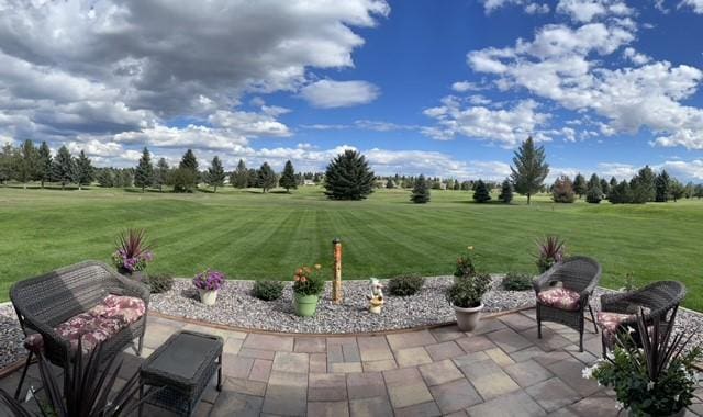 4195 Fox Hollow Dr, Helena, MT 59602 - view of green lawn featuring a patio