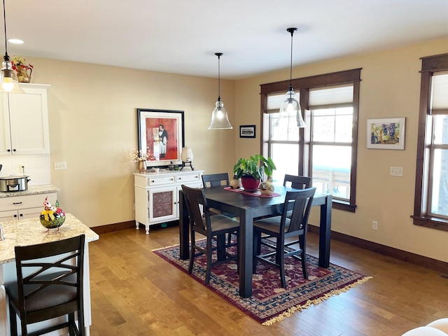 4195 Fox Hollow Dr, Helena, MT 59602 - dining area with wood finished floors and baseboards