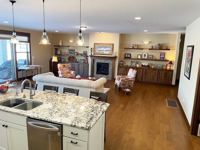 4195 Fox Hollow Dr, Helena, MT 59602 - kitchen featuring a sink, open floor plan, white cabinets, dark wood-style flooring, and recessed lighting