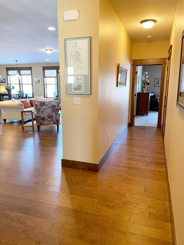 4195 Fox Hollow Dr, Helena, MT 59602 - hallway with hardwood / wood-style floors and baseboards