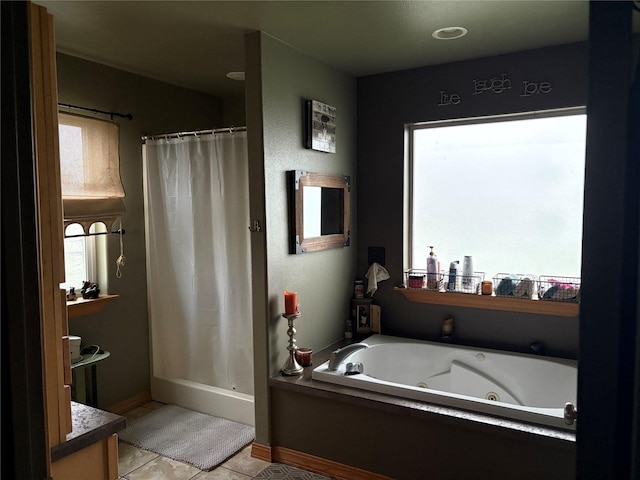 72822 Joes Ln, Arlee, MT 59821 - full bath with tile patterned flooring, curtained shower, a tub with jets, and baseboards