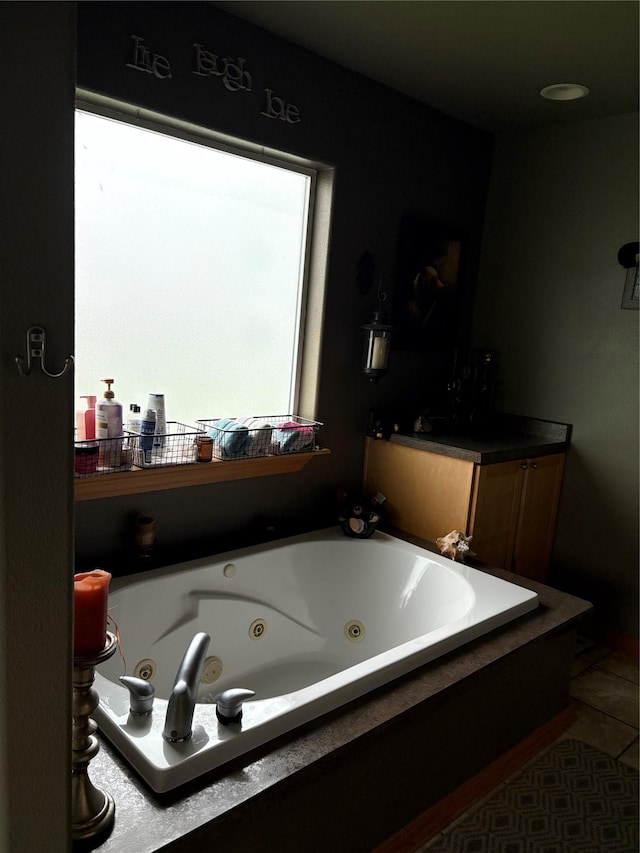 72822 Joes Ln, Arlee, MT 59821 - bathroom with a whirlpool tub and tile patterned floors