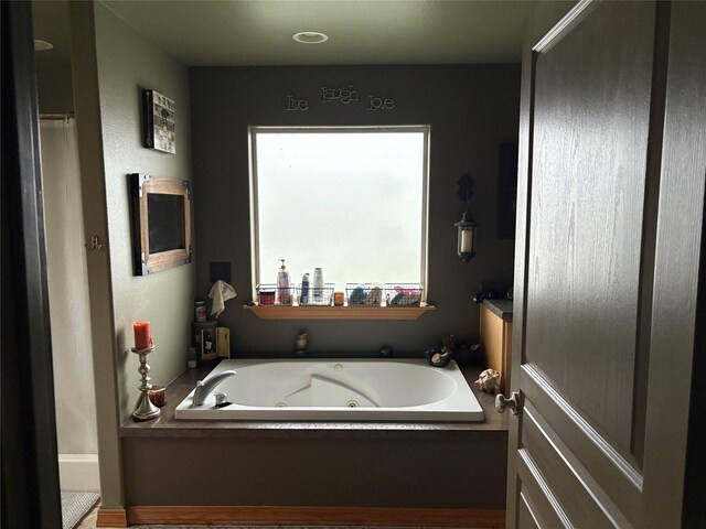 72822 Joes Ln, Arlee, MT 59821 - bathroom with a jetted tub and a shower with curtain