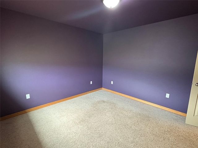 72822 Joes Ln, Arlee, MT 59821 - spare room with carpet flooring and baseboards
